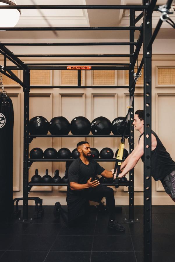 The Ned Hotel London Eksteriør billede A personal trainer working with a client